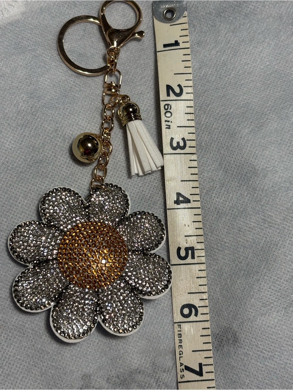 Bag Charm/Keychain Crystal Daisy w/Gold bling Center &White Tassel